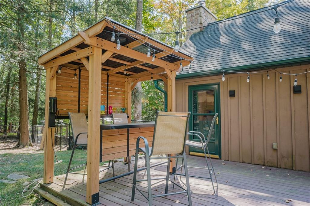 324 Troxell Spring Road Flinton, PA 16640 - Photo 44 of 50 a patio with table and chairs