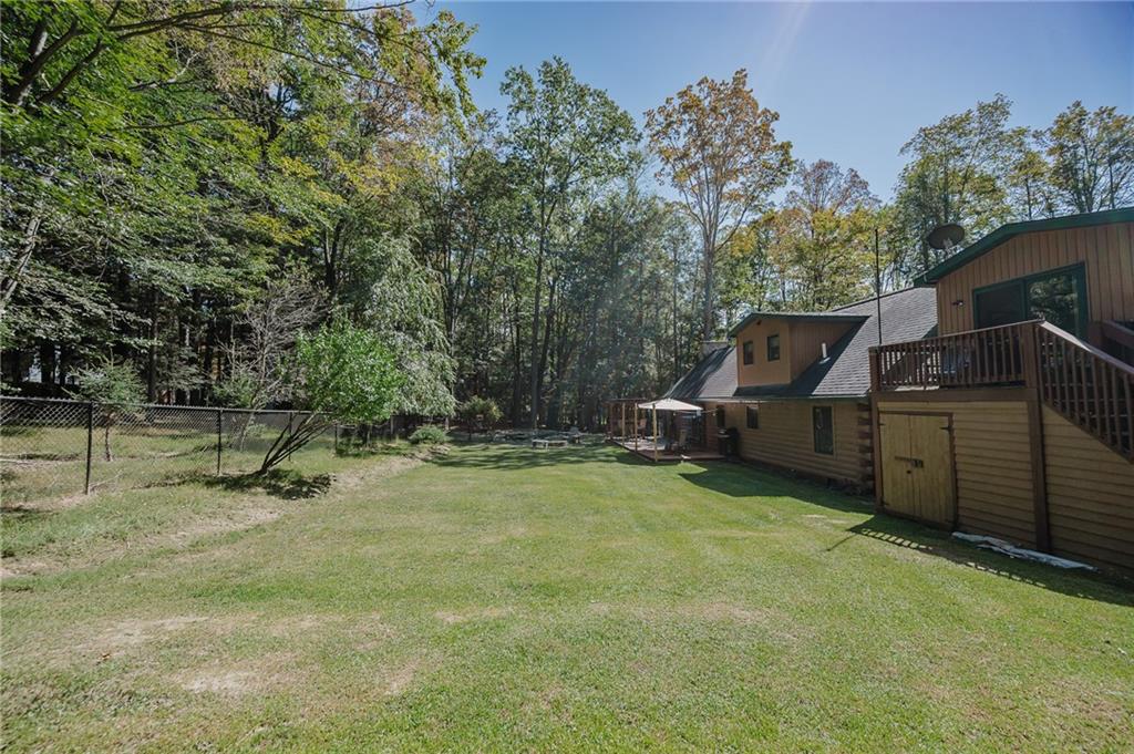 324 Troxell Spring Road Flinton, PA 16640 - Photo 49 of 50 a view of a backyard with sitting area