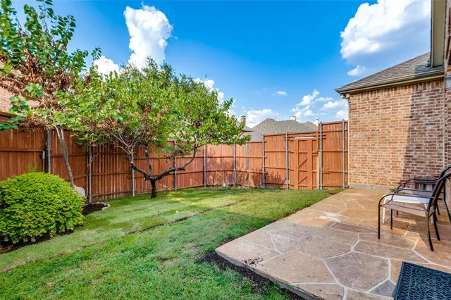 a view of a backyard with a garden
