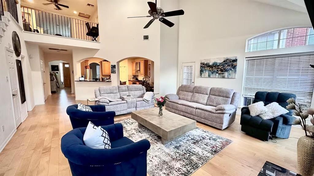 1237 Tioga Drive Irving, TX 75063 - Photo 2 of 15 a living room with furniture or couch and a fireplace