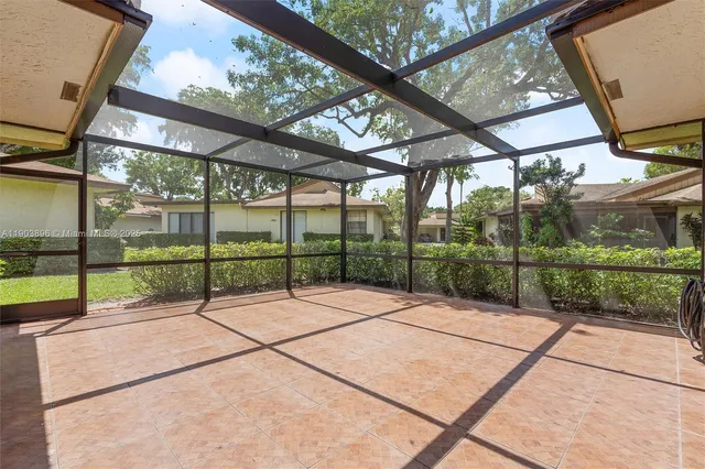 a view of yard with patio