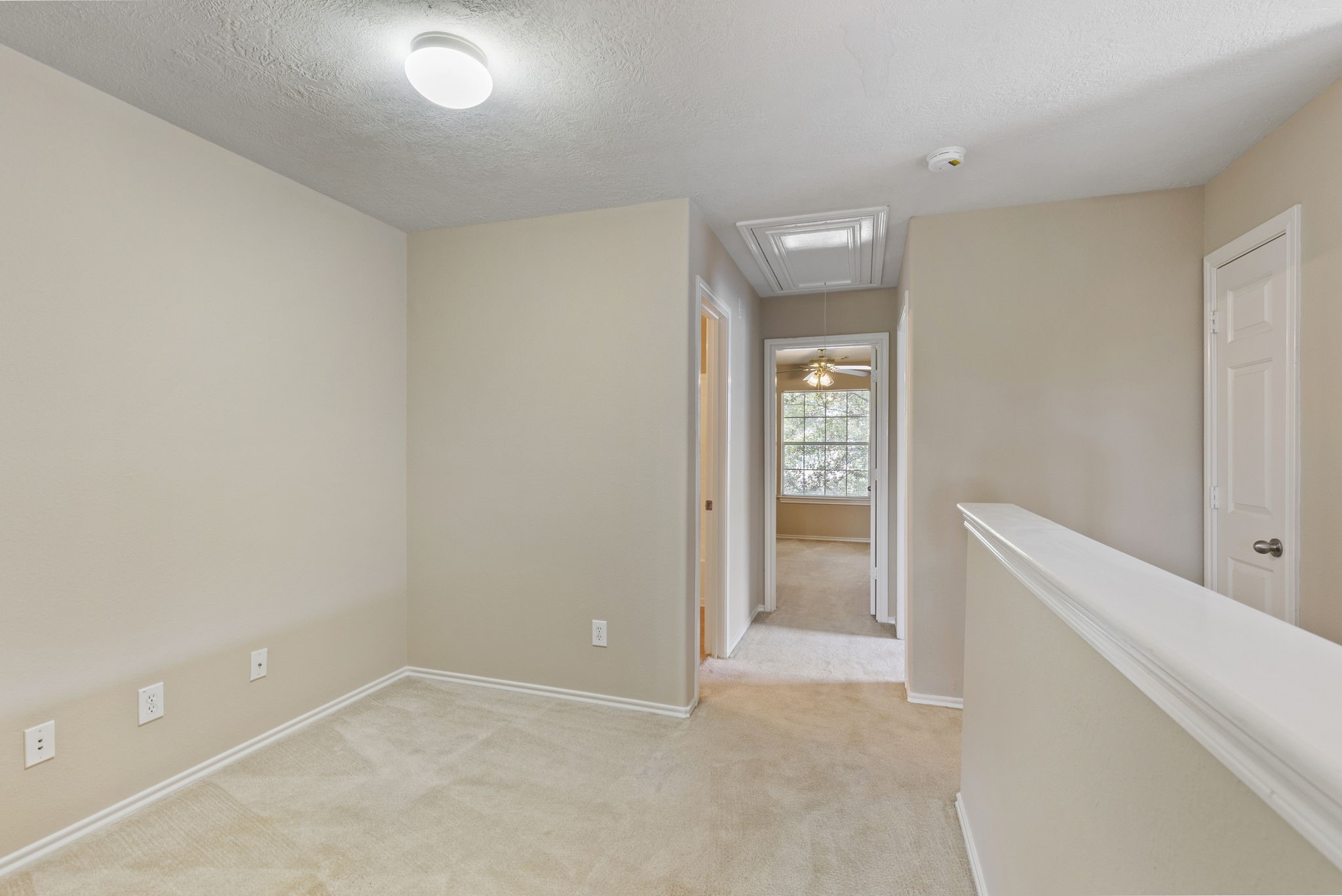 106 East Stedhill Loop Conroe, TX 77384 - Photo 17 of 29 This space is open and works for a study, workout area or toy area for the kiddos.