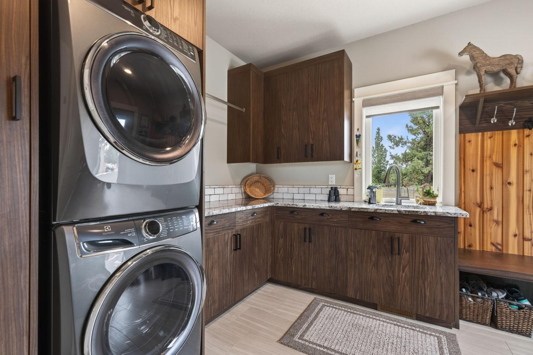 11620 Southwest Pixie Lane Culver, OR 97734 - Photo 30 of 53 a kitchen with a washer and dryer in it