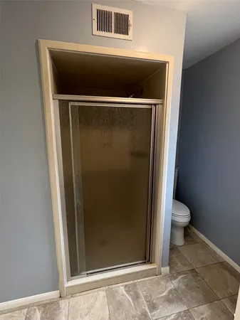 a bathroom with a toilet