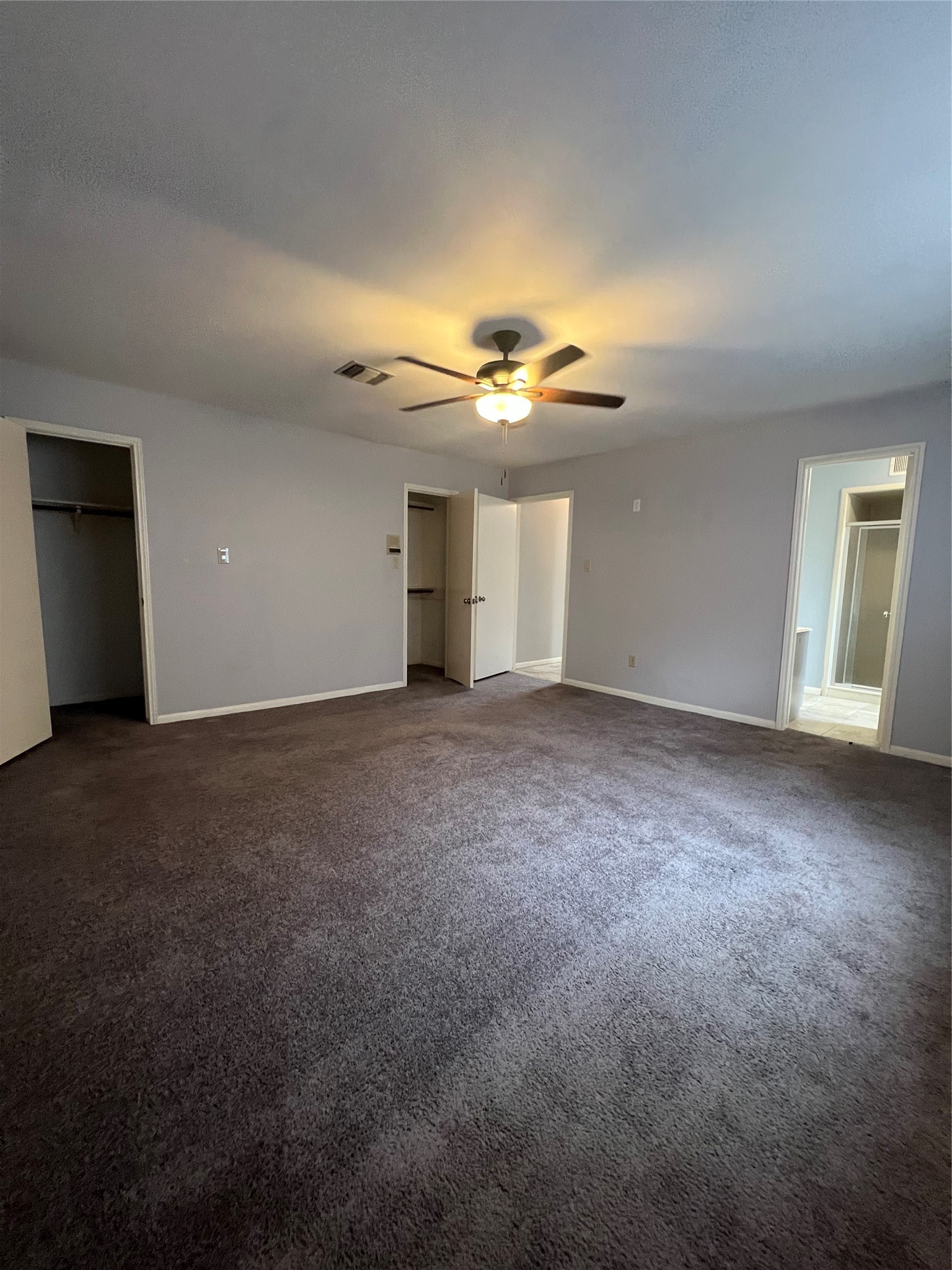 2015 Hamlin Valley Drive Houston, TX 77090 - Photo 19 of 31 a view of an empty room with a chandelier fan