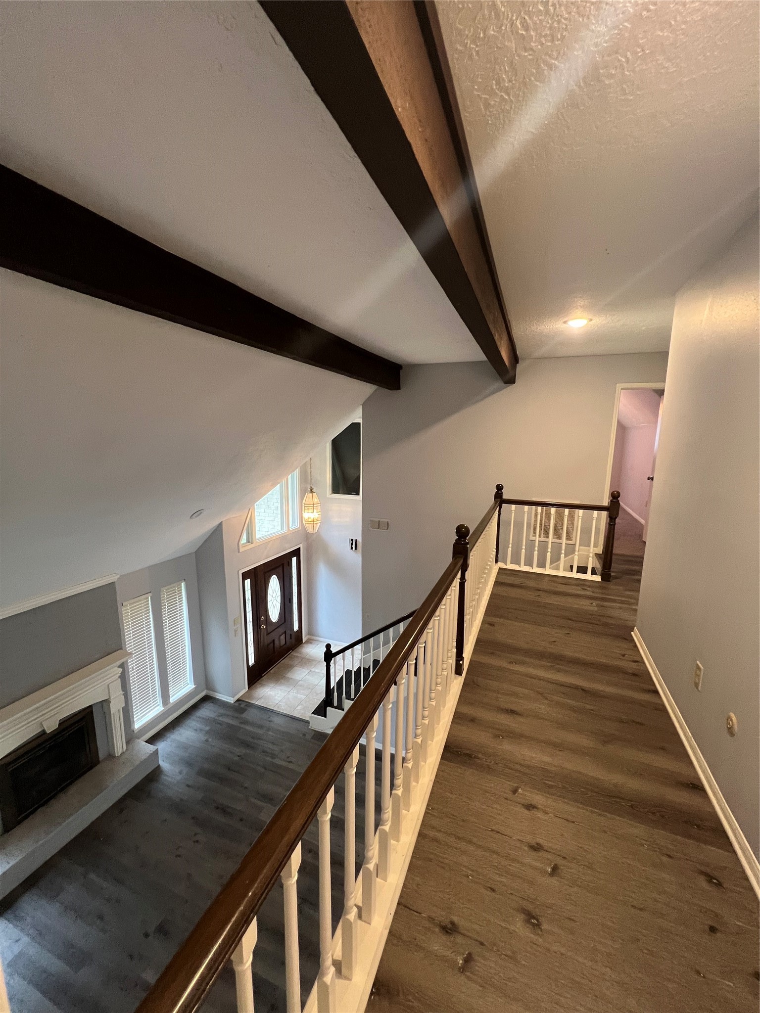 2015 Hamlin Valley Drive Houston, TX 77090 - Photo 20 of 31 a view of entryway and hall with wooden floor