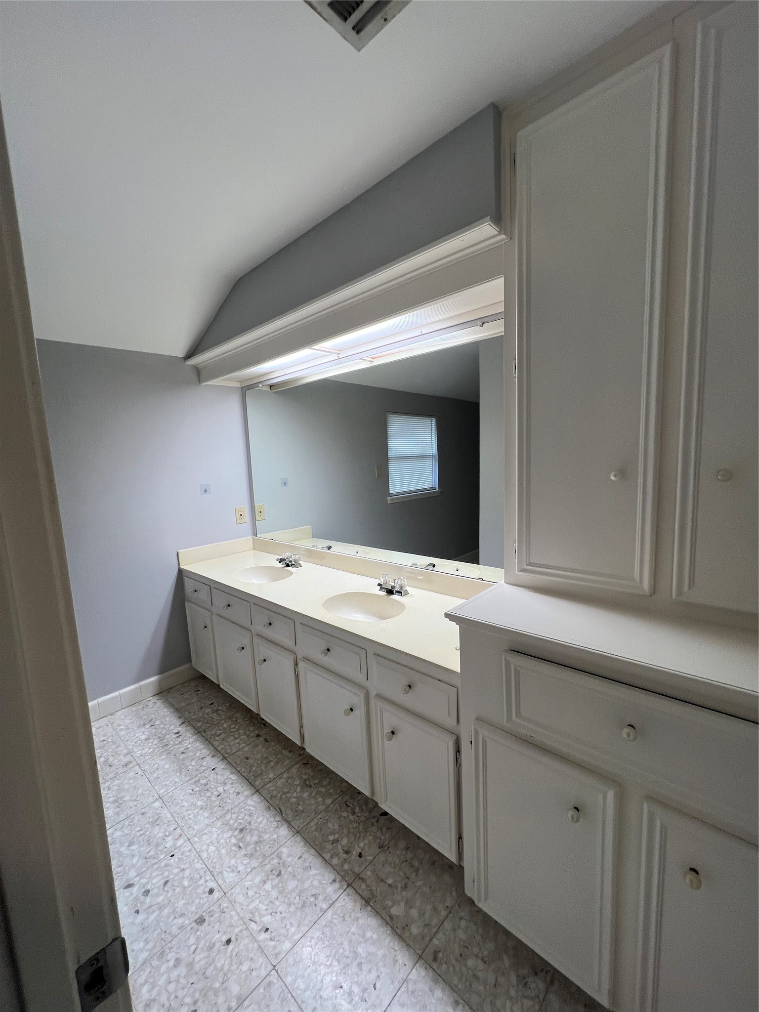 2015 Hamlin Valley Drive Houston, TX 77090 - Photo 23 of 31 a bathroom with a tub sink and mirror