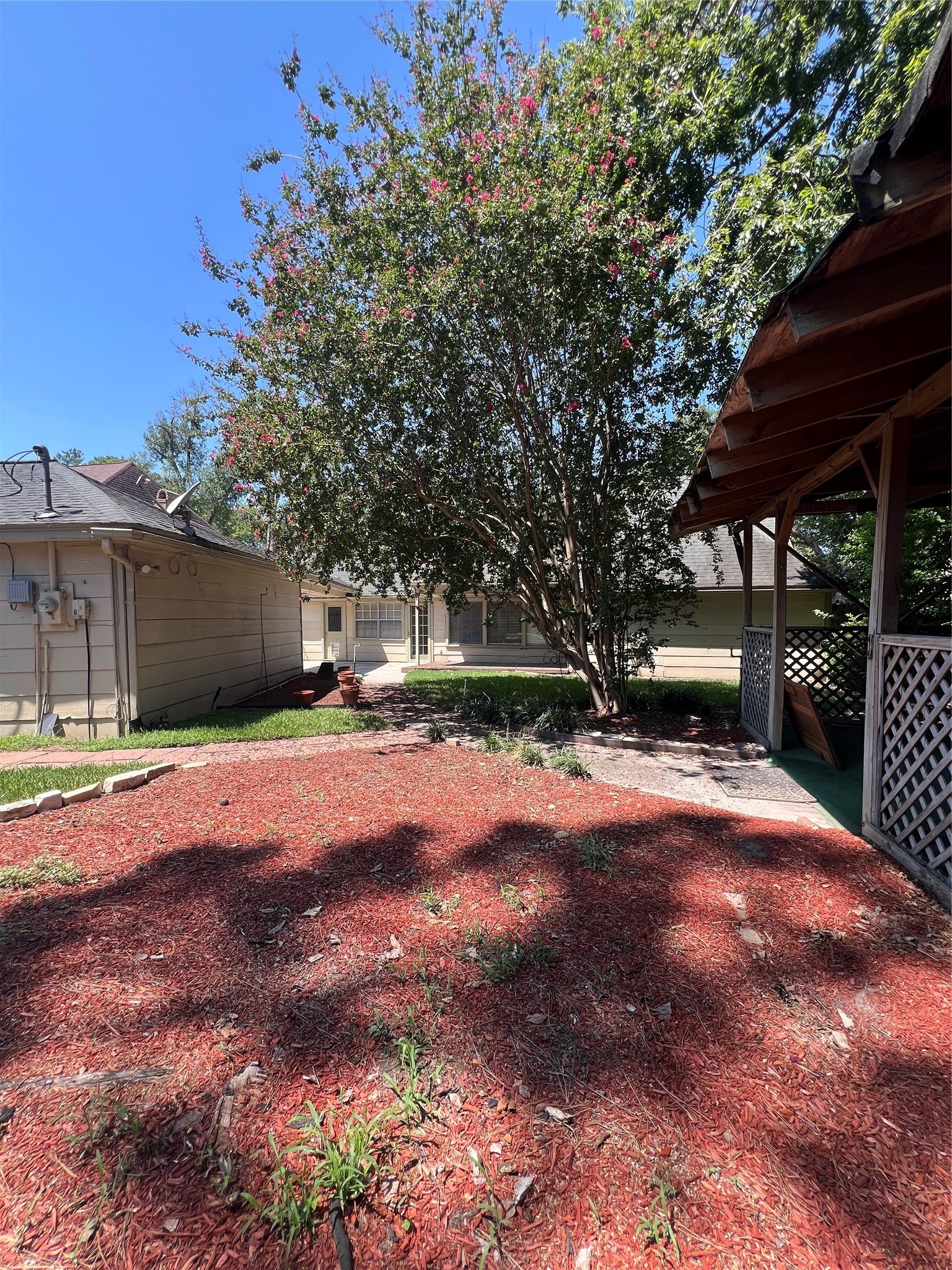 2015 Hamlin Valley Drive Houston, TX 77090 - Photo 27 of 31 a view of a backyard with large trees