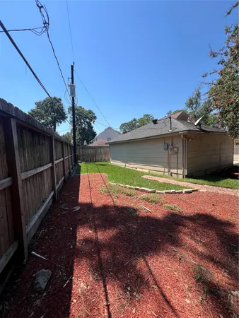 a view of swimming pool with a yard