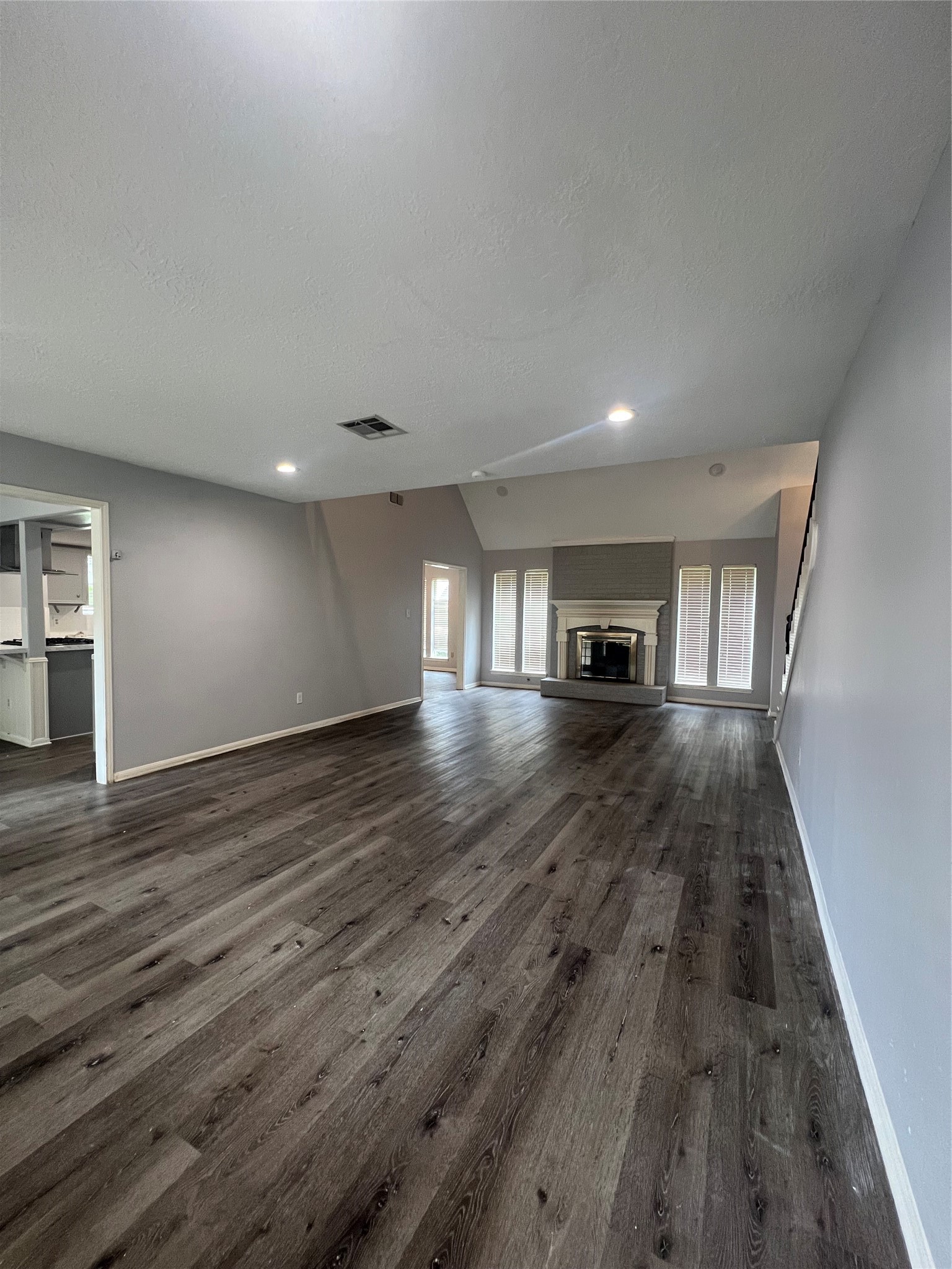 2015 Hamlin Valley Drive Houston, TX 77090 - Photo 7 of 31 a view of empty room with wooden floor