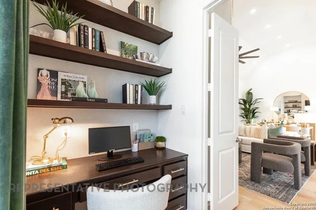 a view of a workspace with furniture