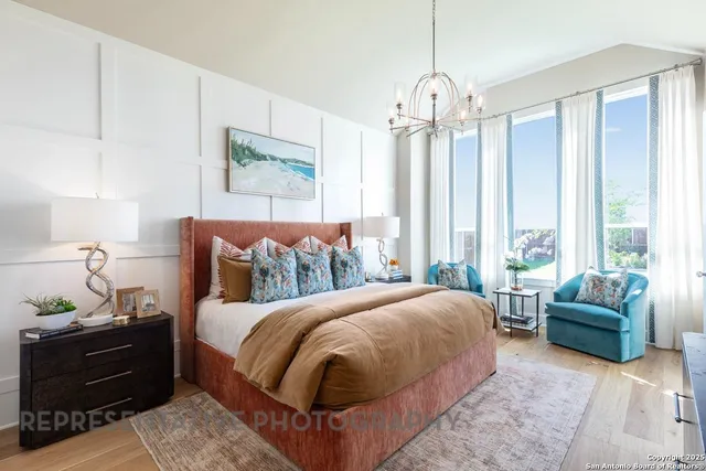 a bedroom with a bed and a couch