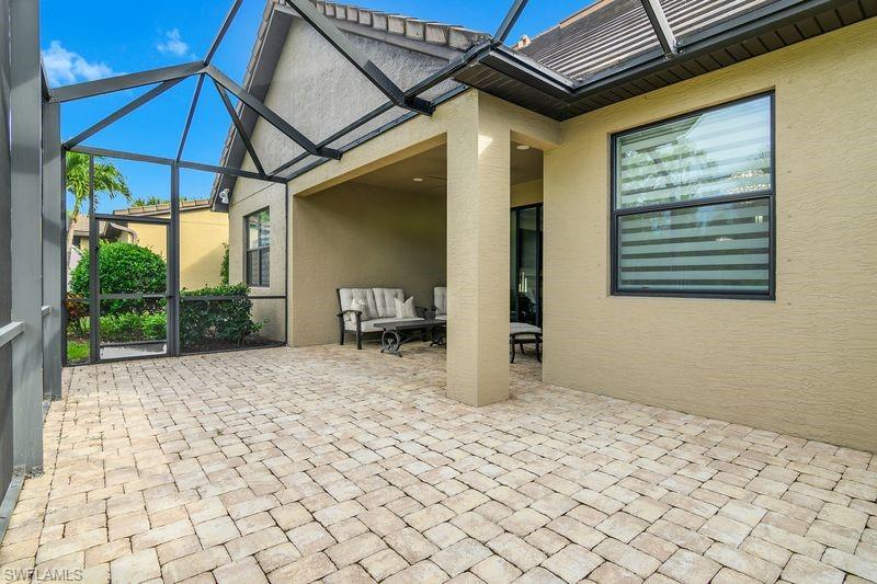 16309 Winfield Lane Naples, FL 34110 - Photo 28 of 36 a house view with a backyard space