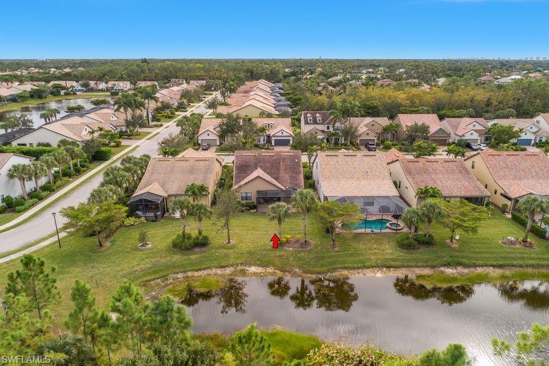 16309 Winfield Lane Naples, FL 34110 - Photo 36 of 36 an aerial view of residential houses with outdoor space and swimming pool