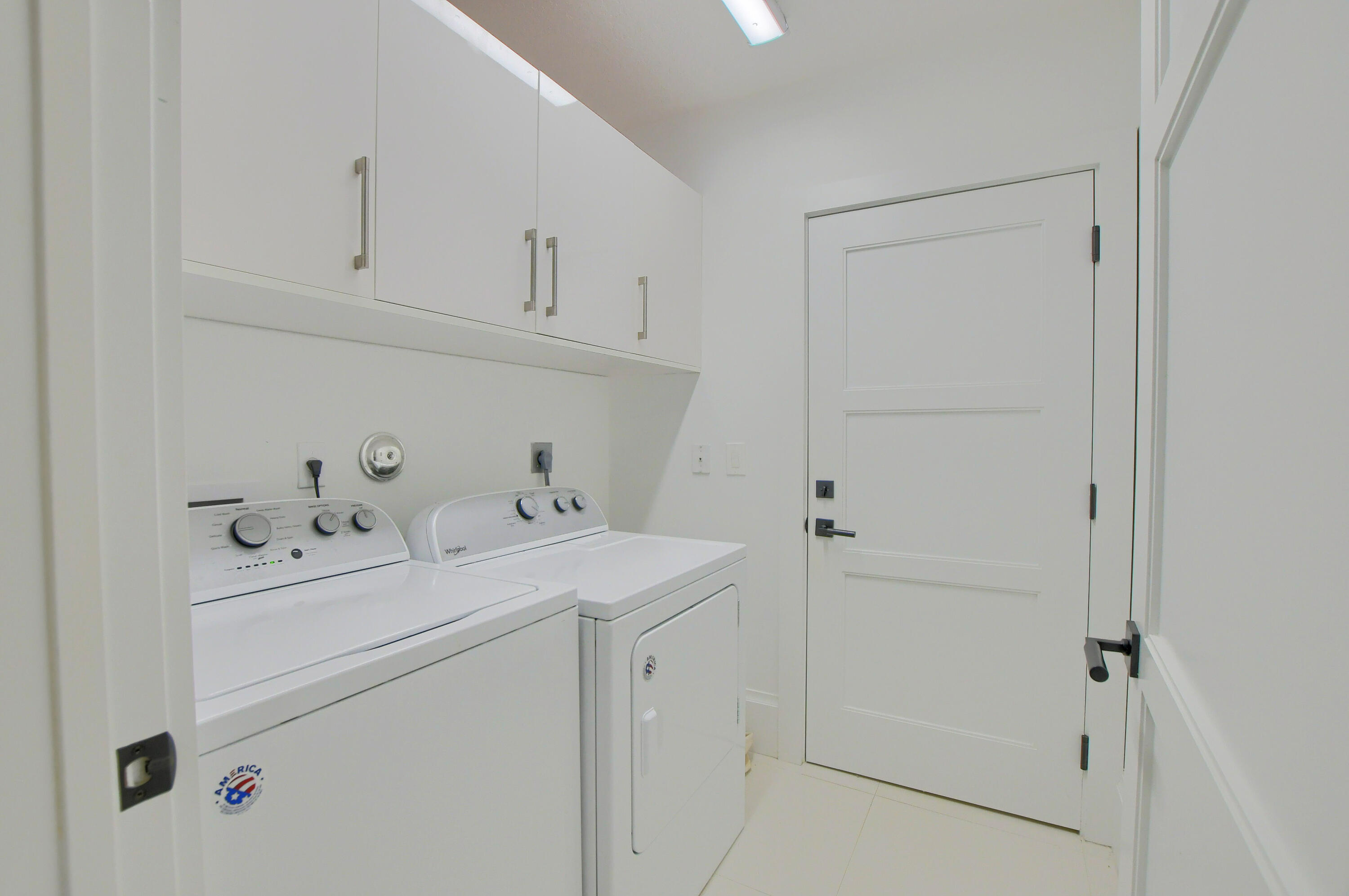 2548 Coco Plum Boulevard, Unit 704 Boca Raton, FL 33496 - Photo 35 of 39 LAUNDRY ROOM