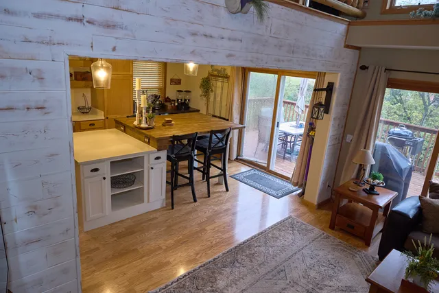 a view of a lake with houses in the back