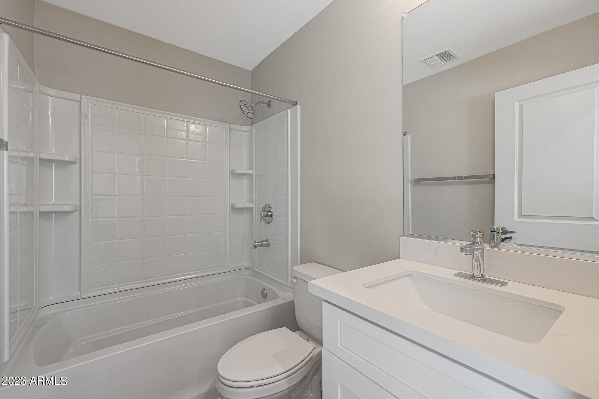 6060 East Baseline Road, Unit 156 Mesa, AZ 85206 - Photo 13 of 45 a bathroom with a sink a toilet and shower