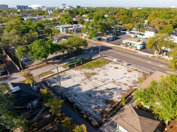 a view of a yard with an outdoor seating