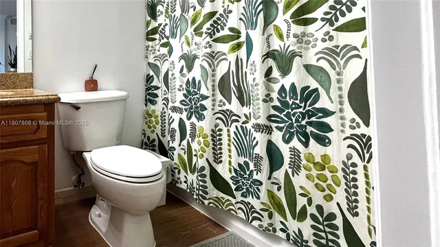 a bathroom with a toilet and a sink