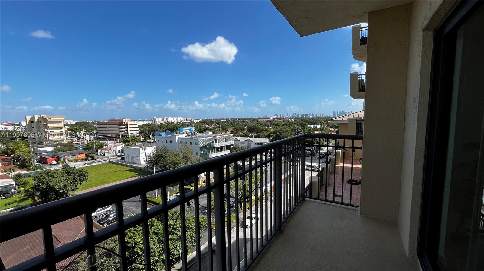 4242 Northwest 2nd Street, Unit 703 Miami, FL 33126 - Photo 18 of 25 a view of city from a balcony