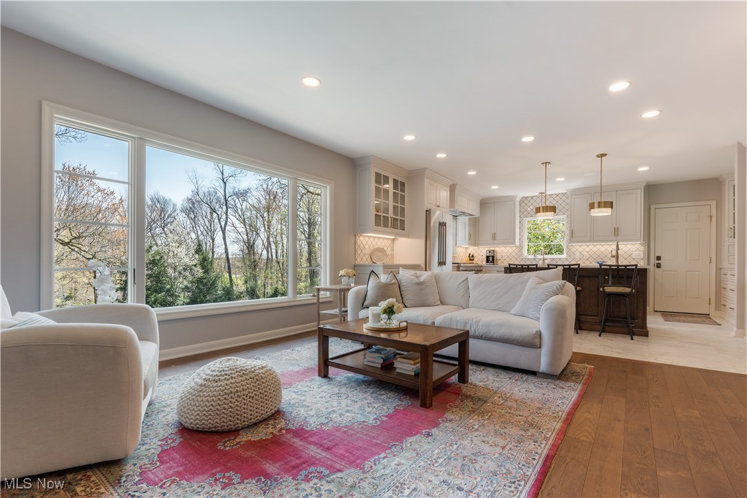 2622 Glenmont Road Northwest Canton, OH 44708 - Photo 19 of 45 Living room with hardwood / wood-style flooring, baseboards, and recessed lighting