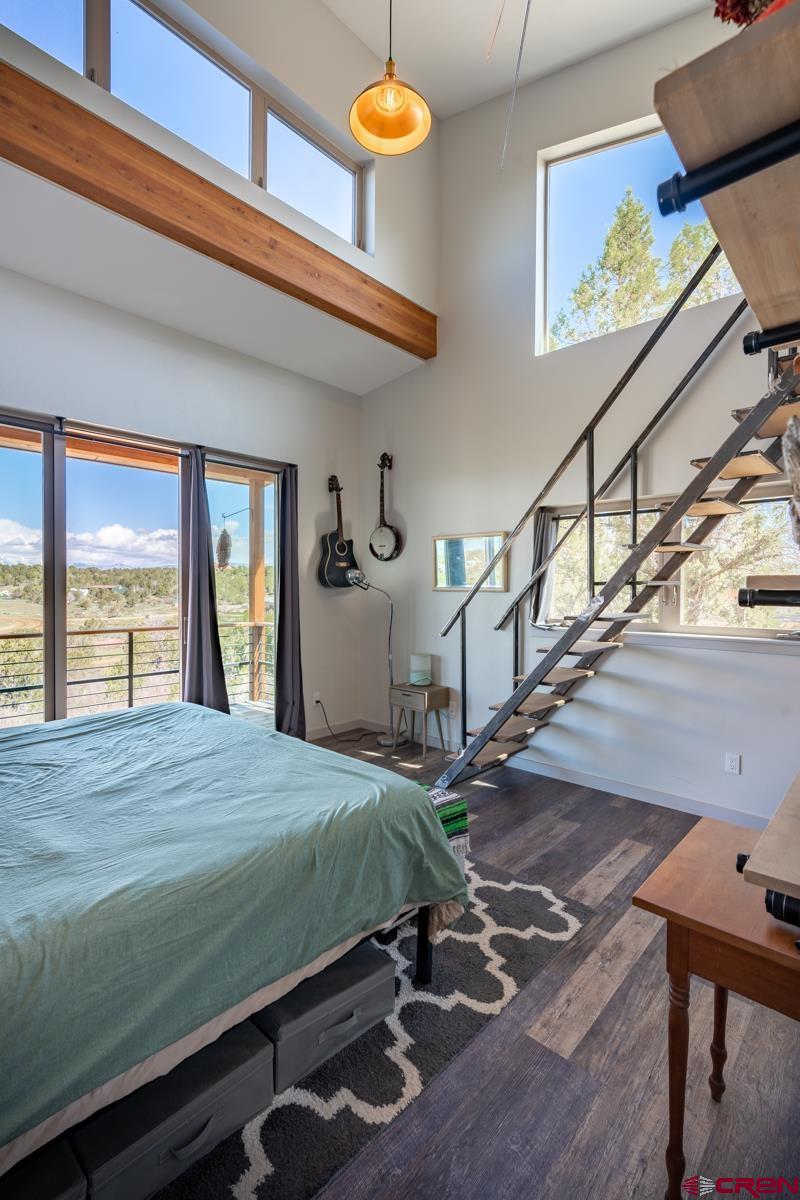 68 Cody Road Durango, CO 81303 - Photo 14 of 35 a bedroom with a bed and window