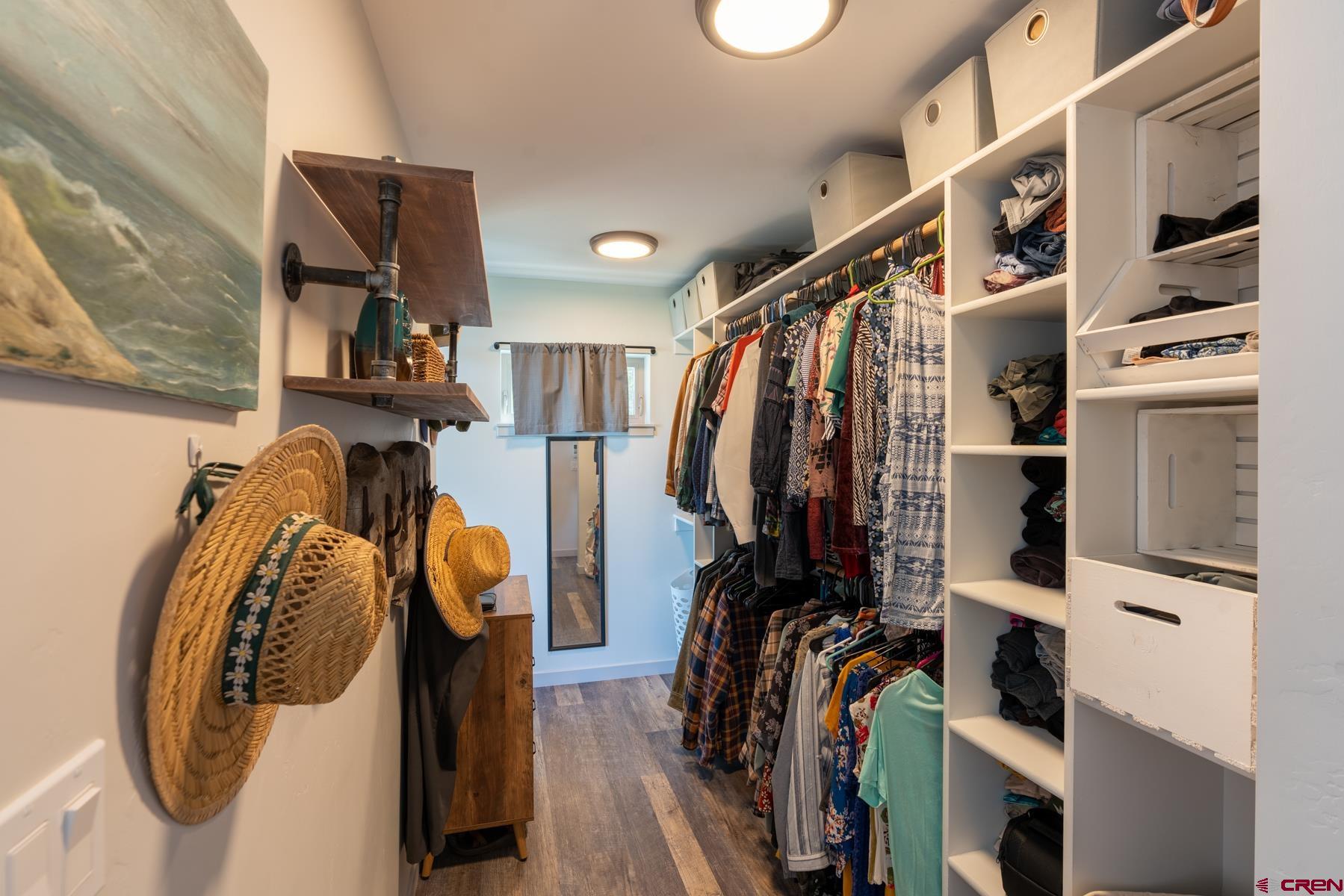 68 Cody Road Durango, CO 81303 - Photo 17 of 35 a view of walk in closet with clothes and shoes