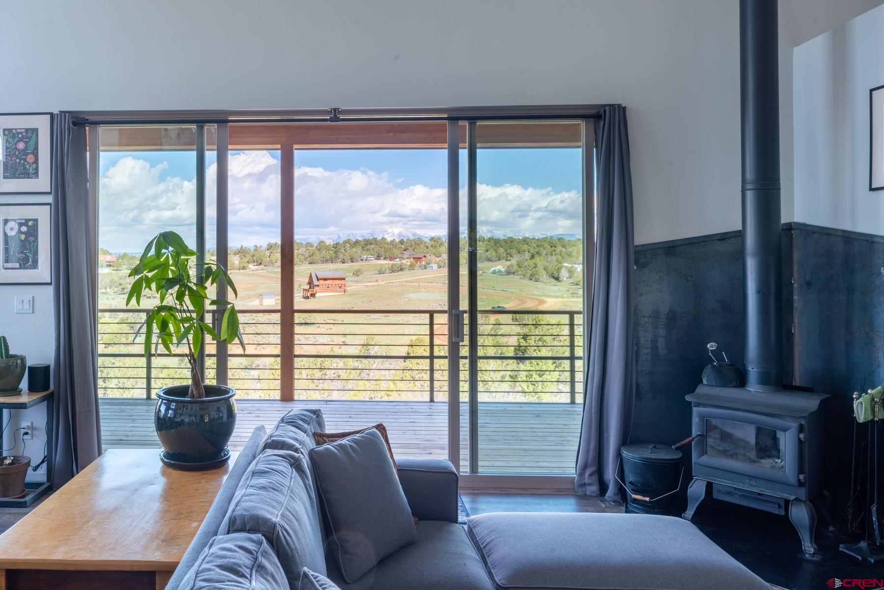 68 Cody Road Durango, CO 81303 - Photo 19 of 35 a living room with furniture and a window