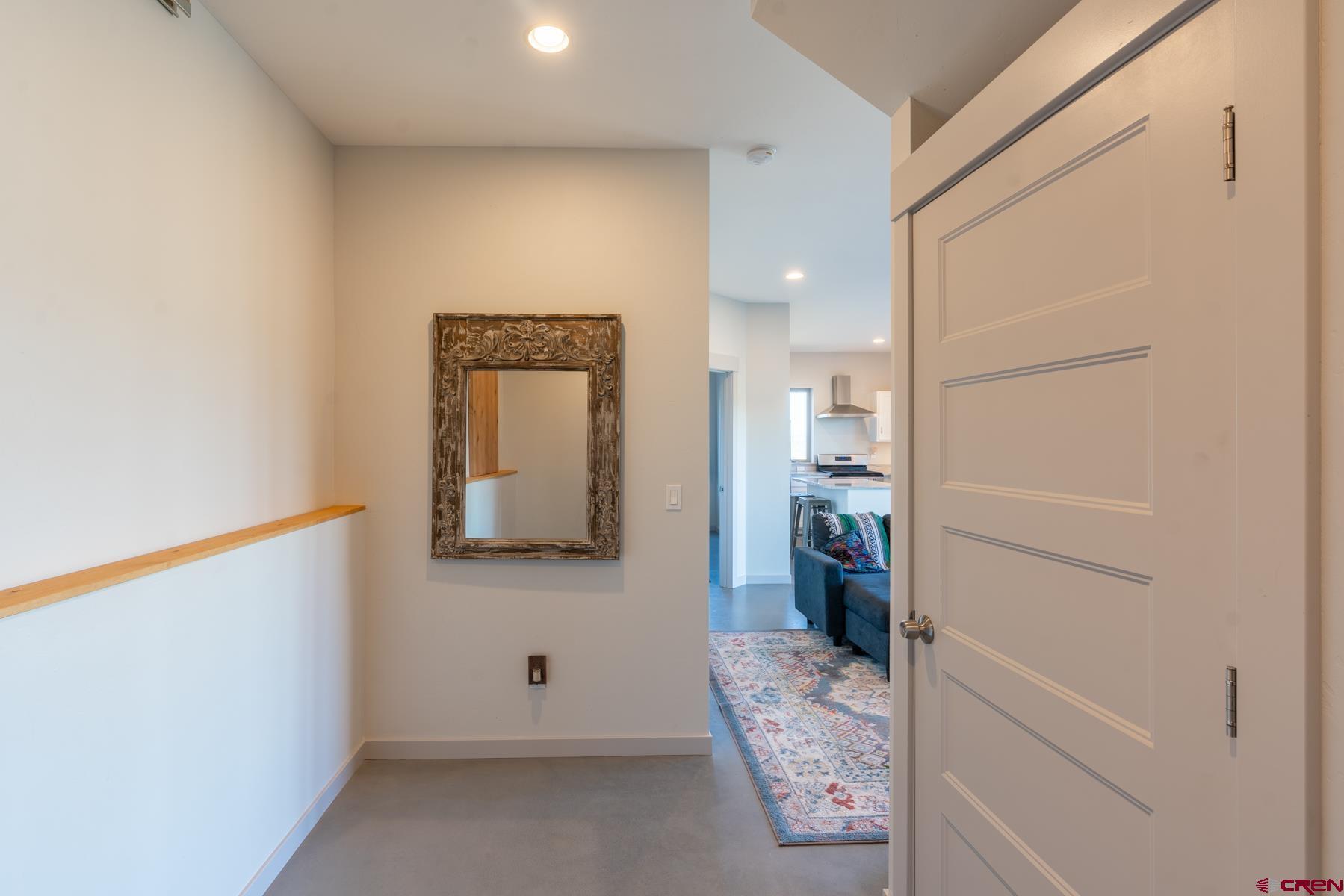 68 Cody Road Durango, CO 81303 - Photo 25 of 35 a view of a hallway and wooden floor