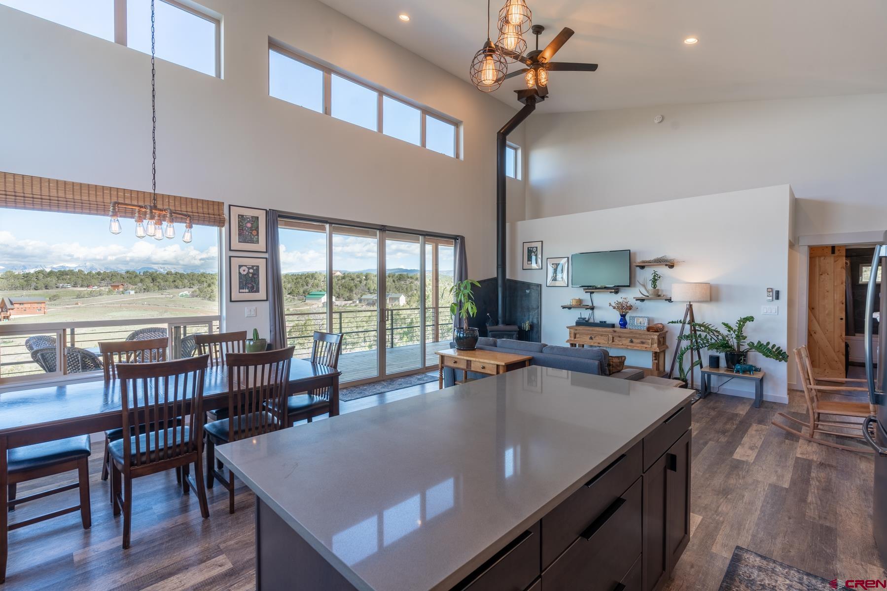 68 Cody Road Durango, CO 81303 - Photo 4 of 35 a view of a dining room with furniture window and wooden floor