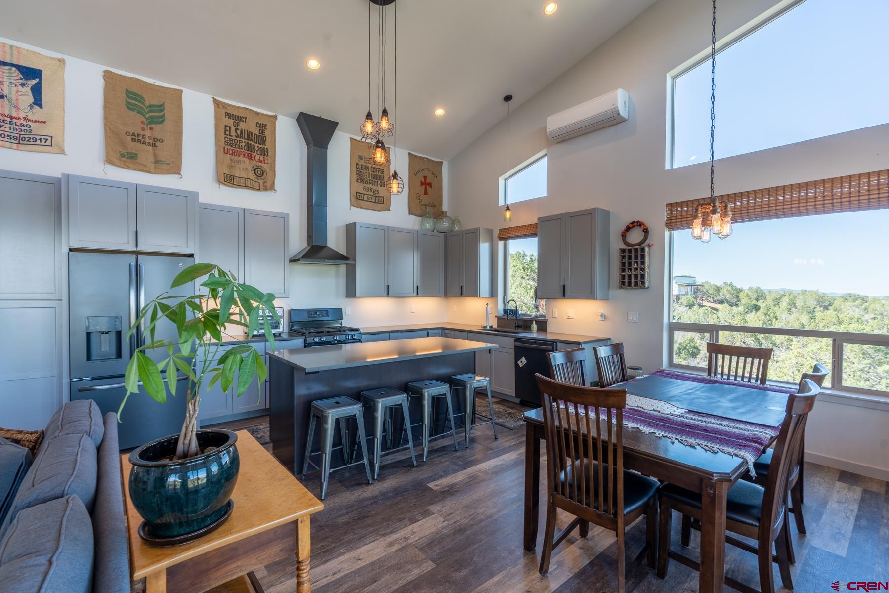 68 Cody Road Durango, CO 81303 - Photo 5 of 35 a dining room with furniture a rug and wooden floor