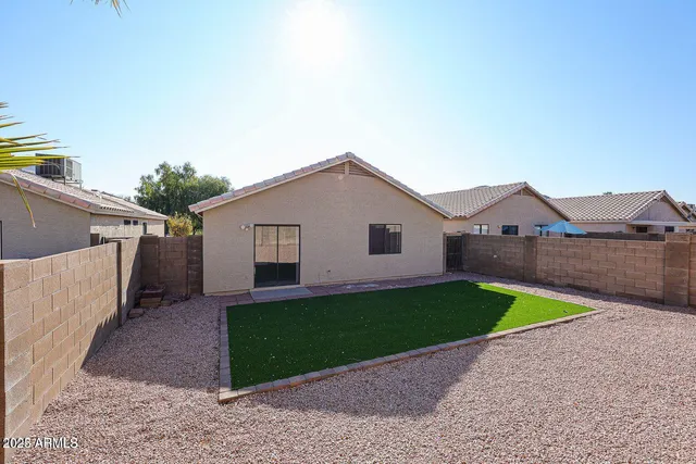 a house view with a backyard space