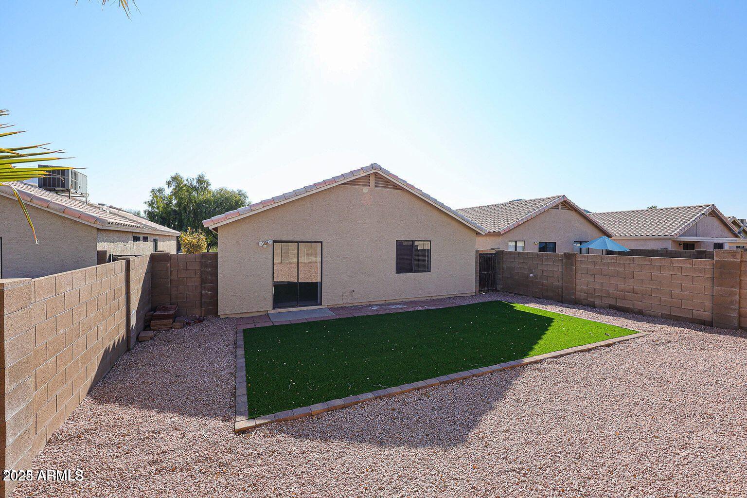2134 East Robin Lane Phoenix, AZ 85024 - Photo 23 of 24 a house view with a backyard space