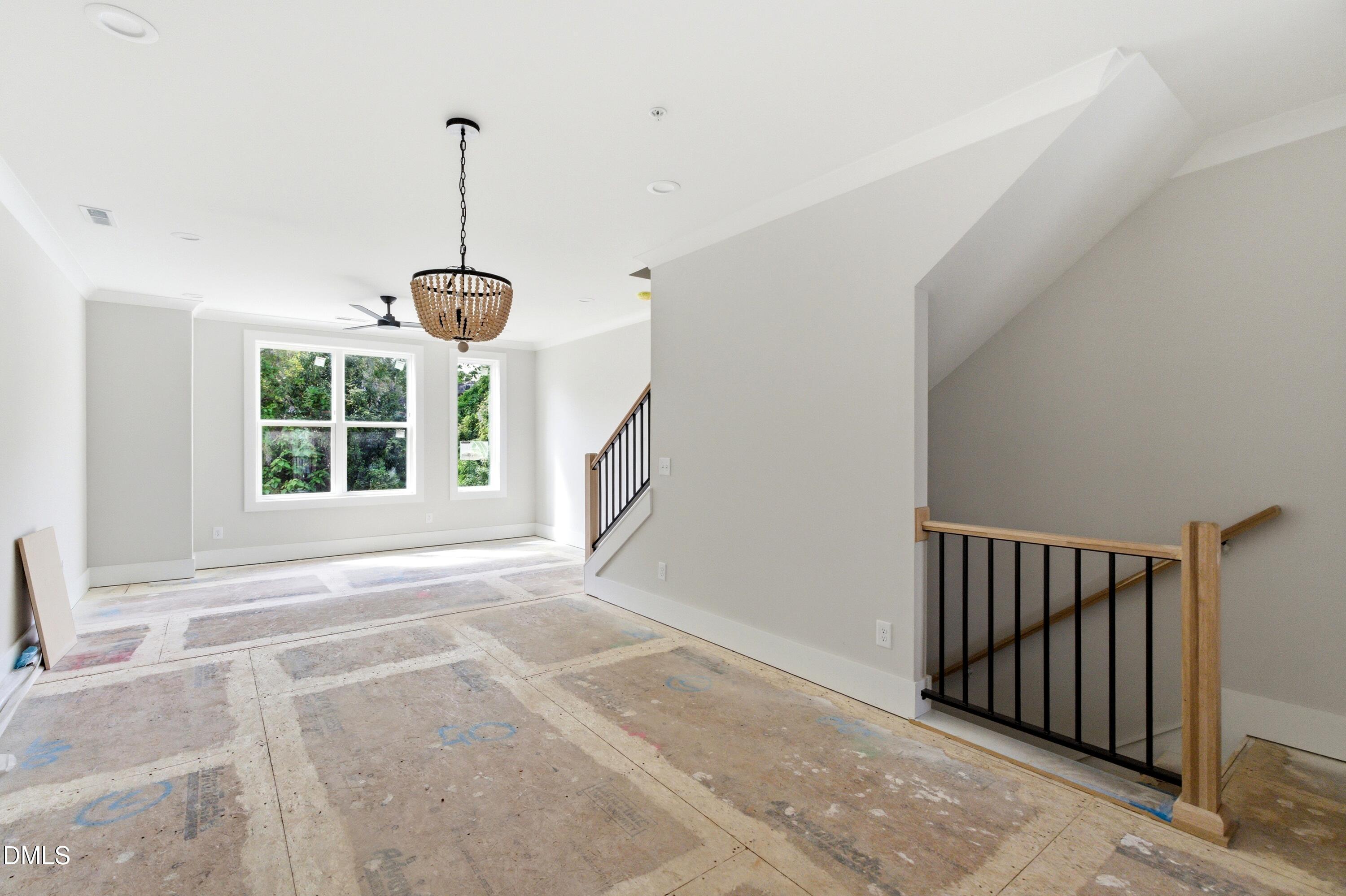 720 Noble Town Way, Unit 104 Raleigh, NC 27603 - Photo 7 of 21 The second story features all of your main living areas including a gourmet kitchen, spacious living areas, dining room, powder room, complete with built-in bluetooth speakers in the ceilings and a second story screened-in porch