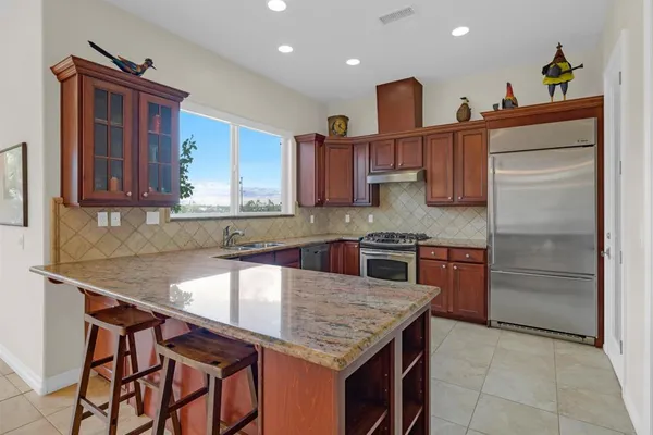 a view of a sink and a mirror