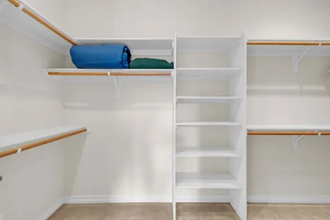 a bathroom with a sink a mirror and a bathtub