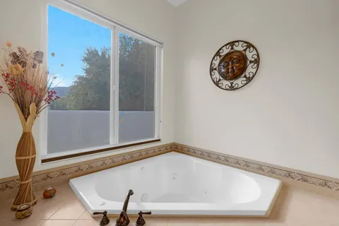 a view of a house with a porch and furniture