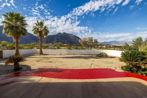 a view of an outdoor space yard swimming pool and mountain view