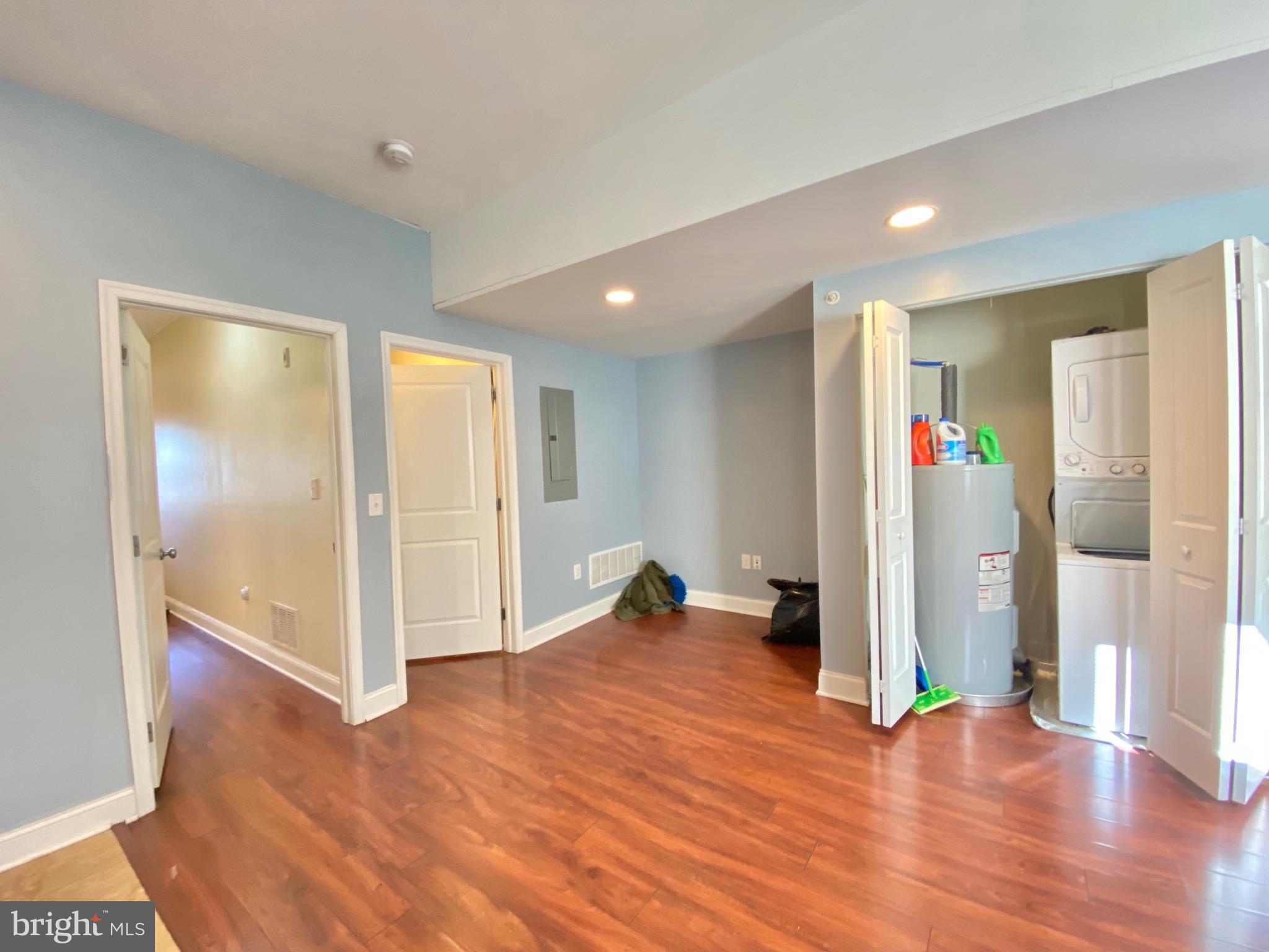 1419 North 17th Street, Unit C Philadelphia, PA 19121 - Photo 5 of 21 a view of empty room with wooden floor