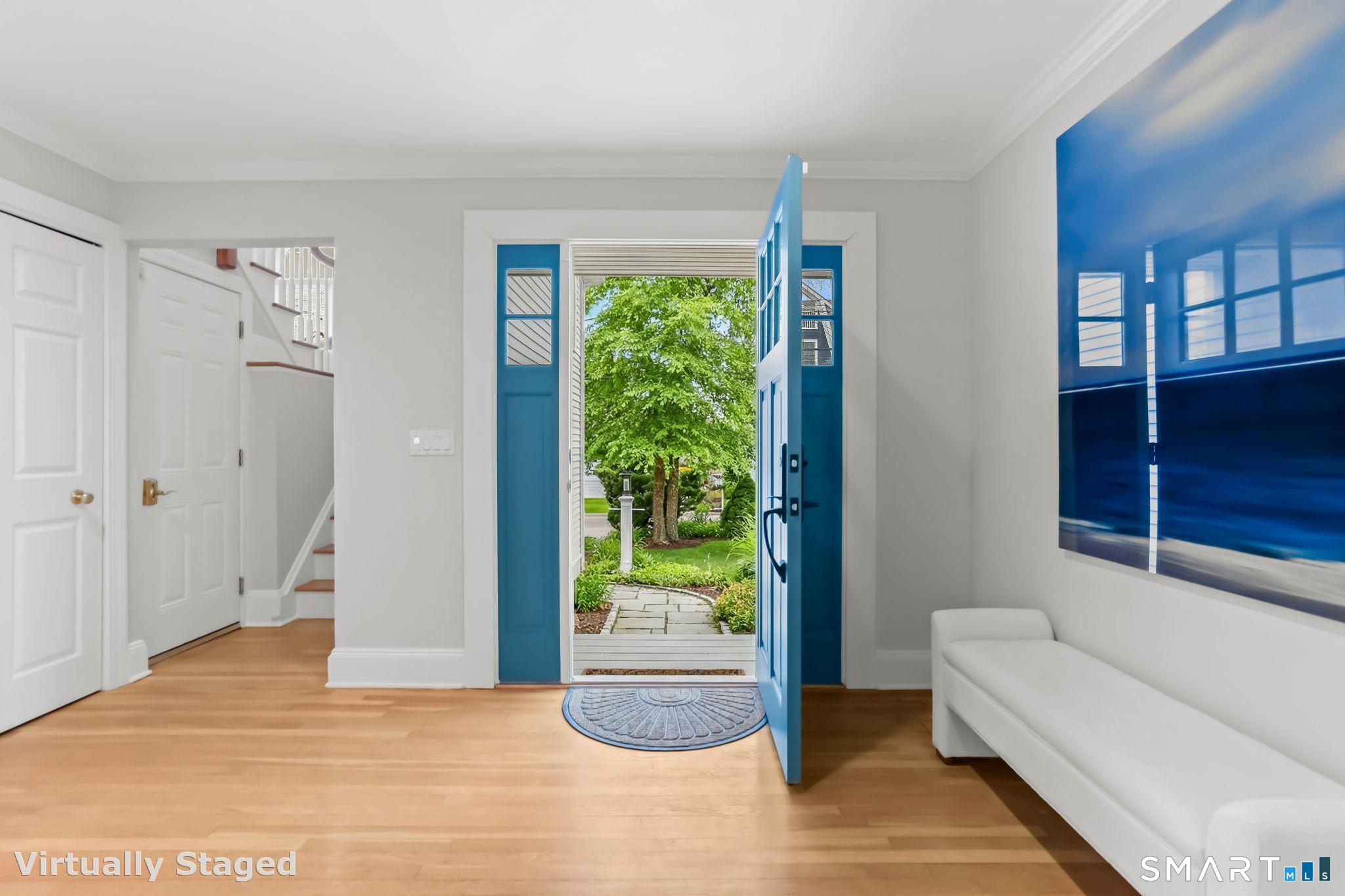 1149 Fairfield Beach Road Fairfield, CT 06824 - Photo 7 of 40 a view of an entryway with furniture and garden