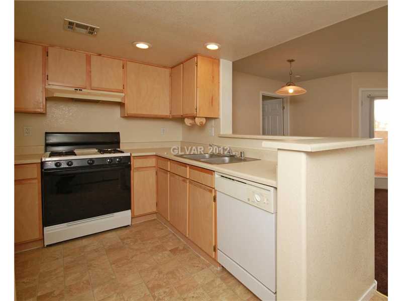 1830 North Pecos Road, Unit 145 Las Vegas, NV 89115 - Photo 5 of 15 Kitchen.