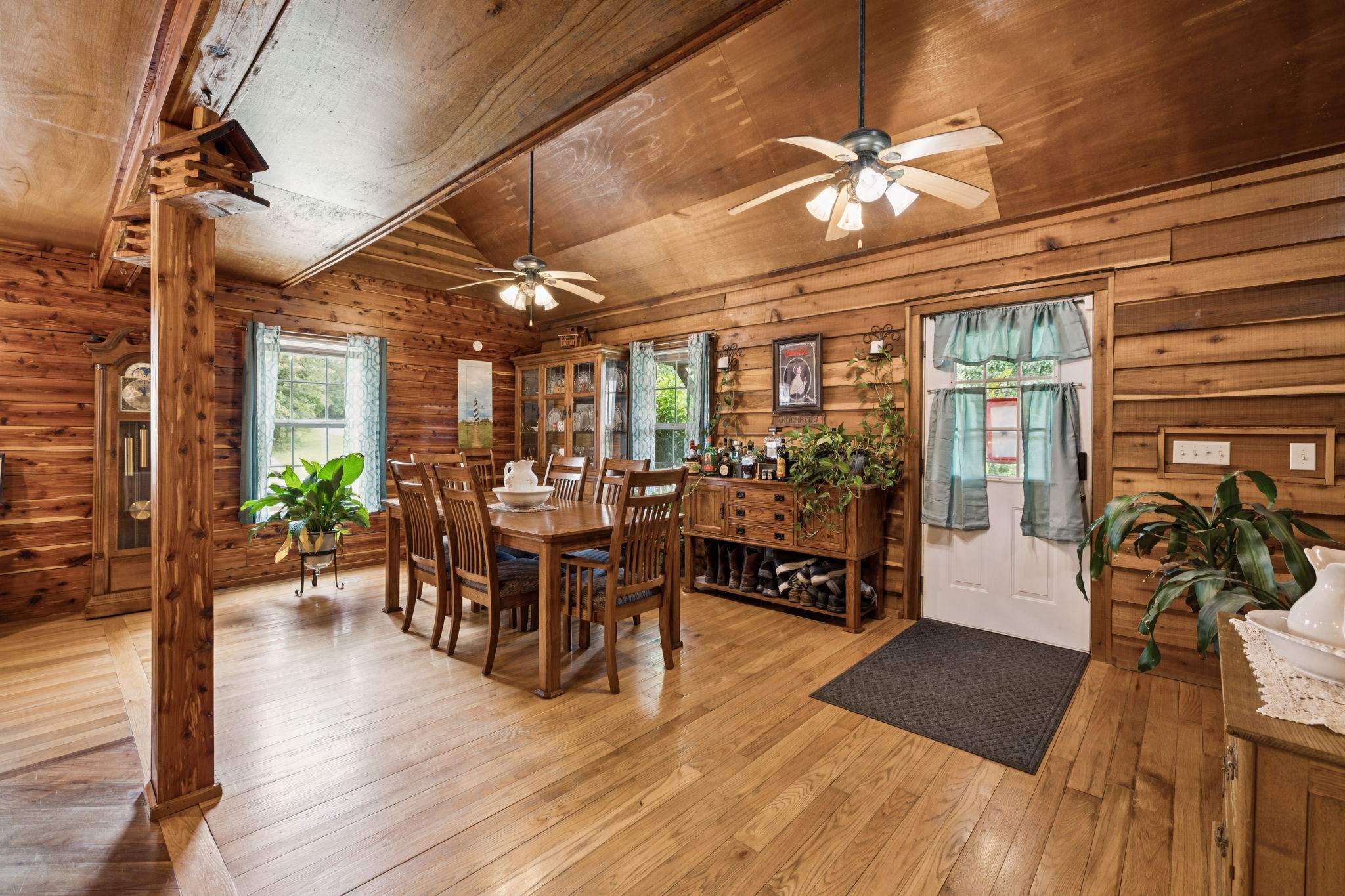 176 Robert Hensley Road Hohenwald, TN 38462 - Photo 13 of 87 a view of a dining room with furniture window and wooden floor