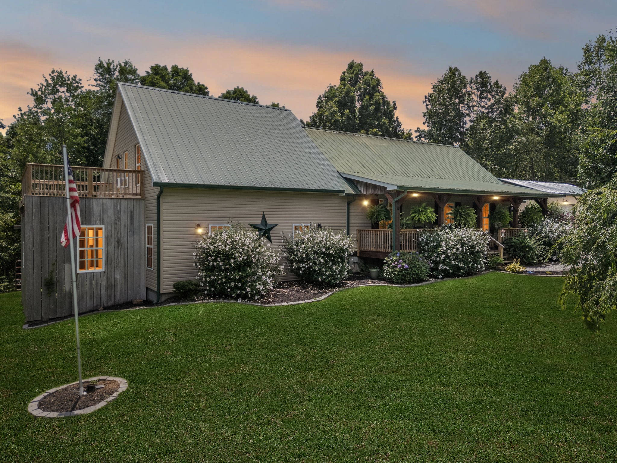 176 Robert Hensley Road Hohenwald, TN 38462 - Photo 2 of 87 a house that is sitting in the grass