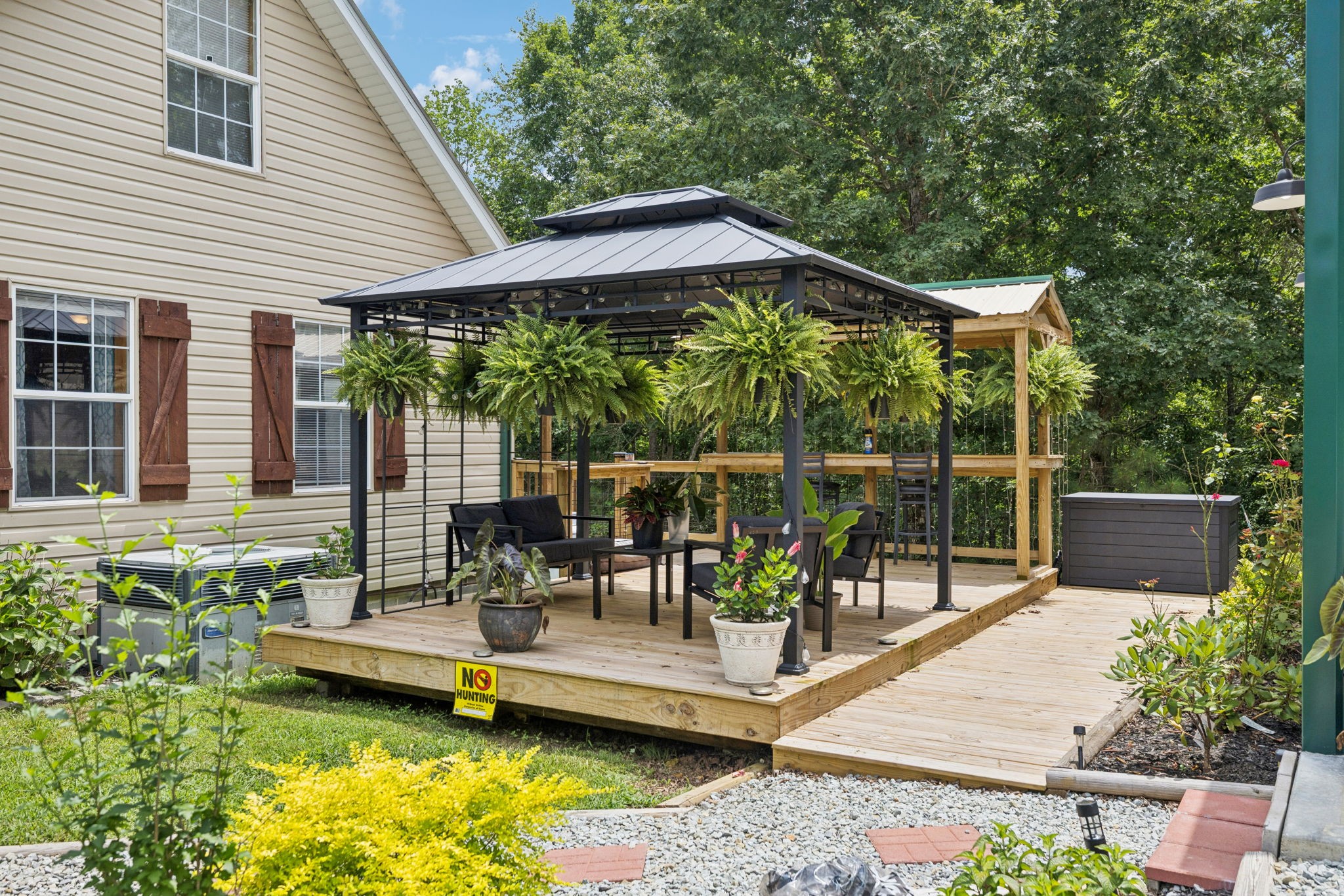176 Robert Hensley Road Hohenwald, TN 38462 - Photo 49 of 87 a view of a swimming pool with a patio