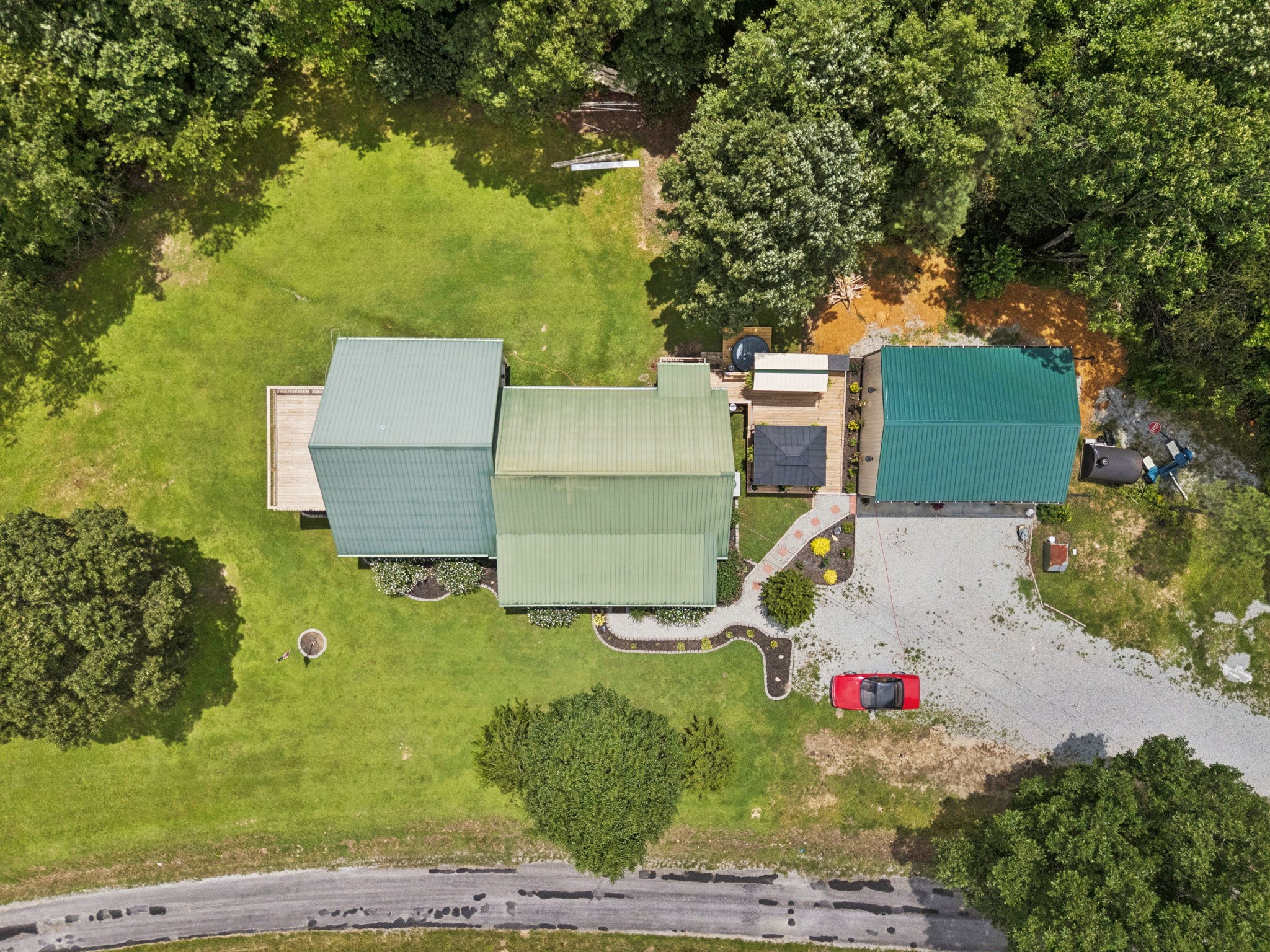 176 Robert Hensley Road Hohenwald, TN 38462 - Photo 87 of 87 an aerial view of a house with a yard