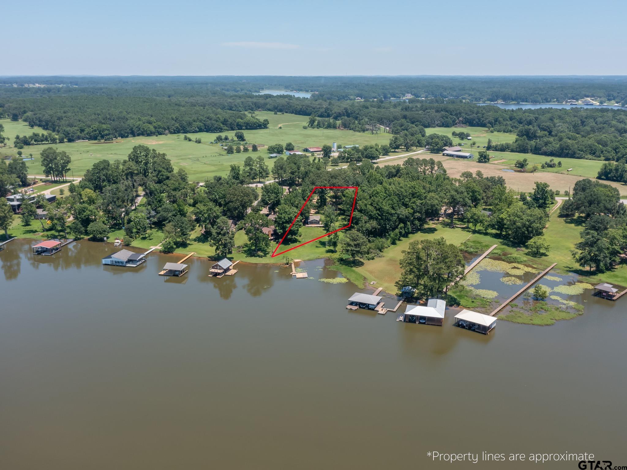15606 McElroy Road Whitehouse, TX 75791 - Photo 19 of 37 an aerial view of a houses with a lake view