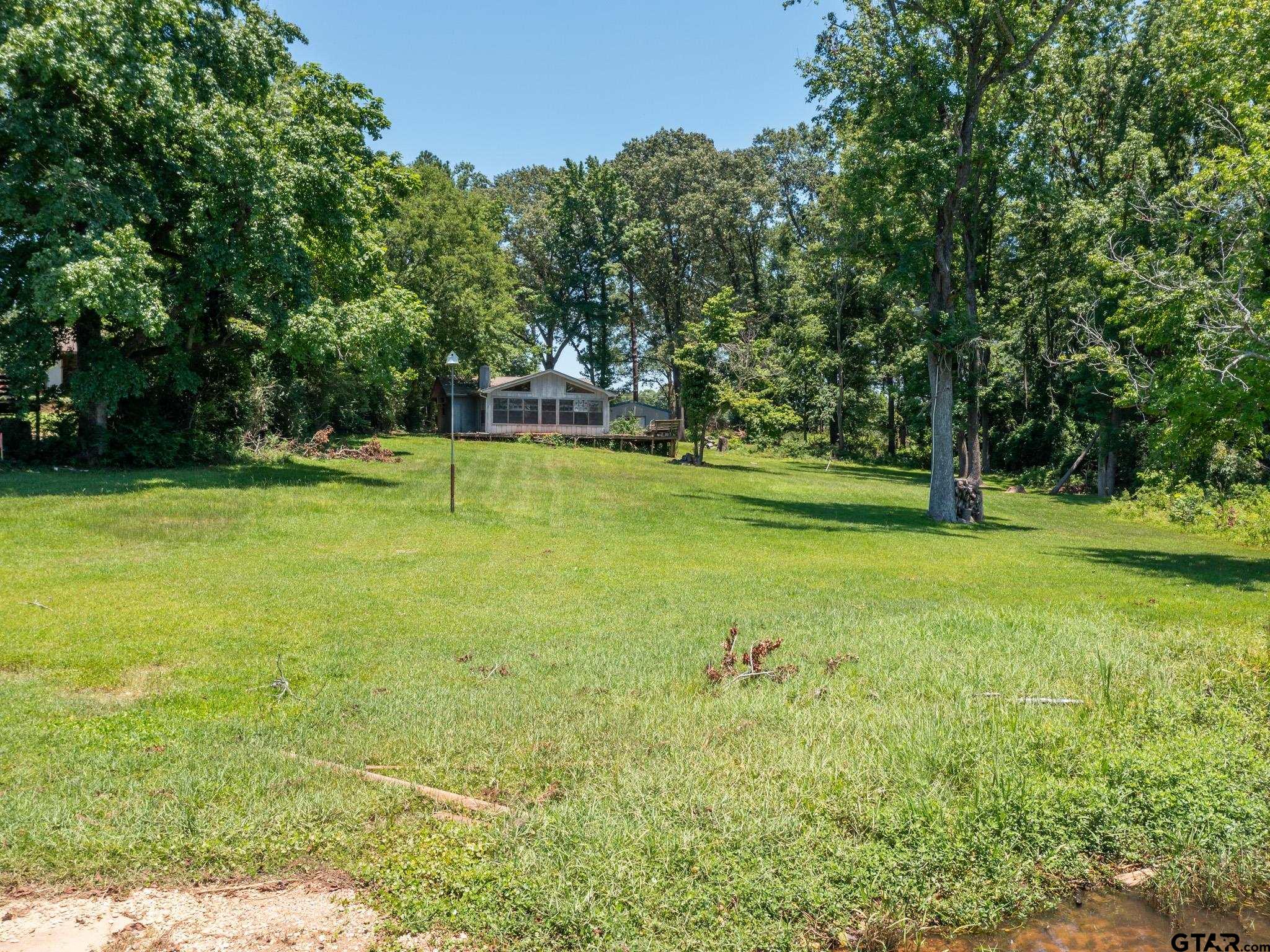 15606 McElroy Road Whitehouse, TX 75791 - Photo 22 of 37 a view of a park with large trees