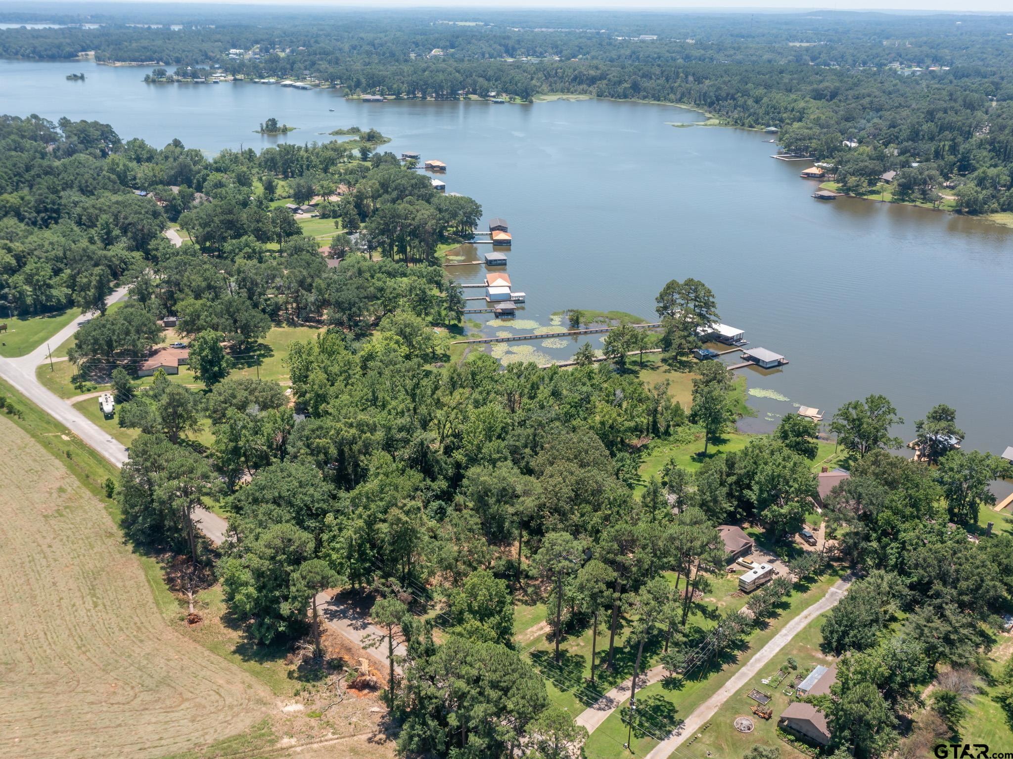 15606 McElroy Road Whitehouse, TX 75791 - Photo 24 of 37 an aerial view of a houses with outdoor space and lake view