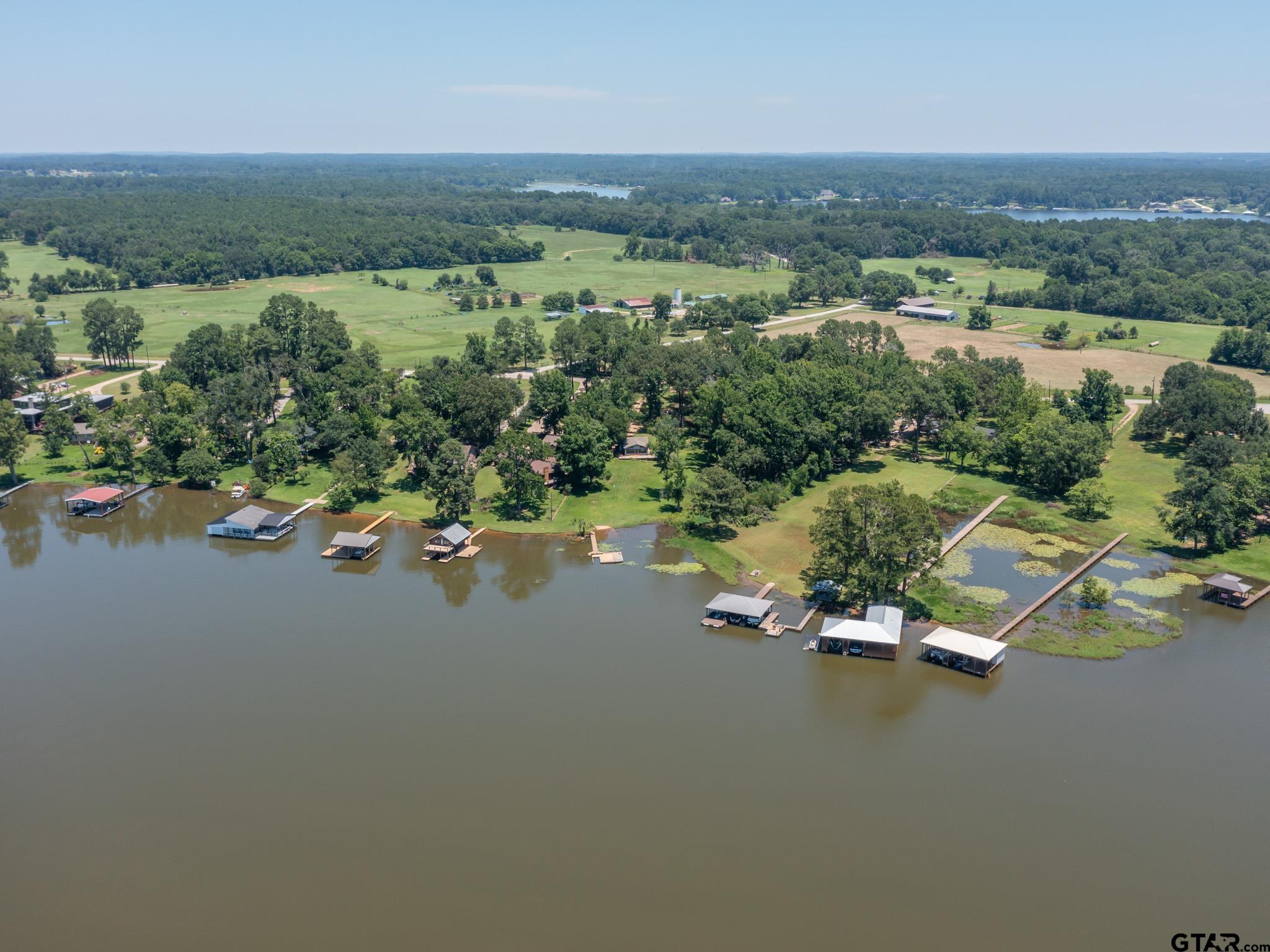 15606 McElroy Road Whitehouse, TX 75791 - Photo 9 of 37 an aerial view of a houses with a lake view