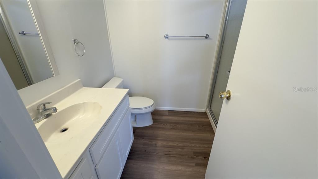 10928 Federal Drive Port Richey, FL 34668 - Photo 11 of 12 a bathroom with a sink and toilet